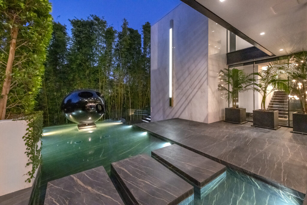 Evening pool at Strip Casa West Hollywood luxury estate