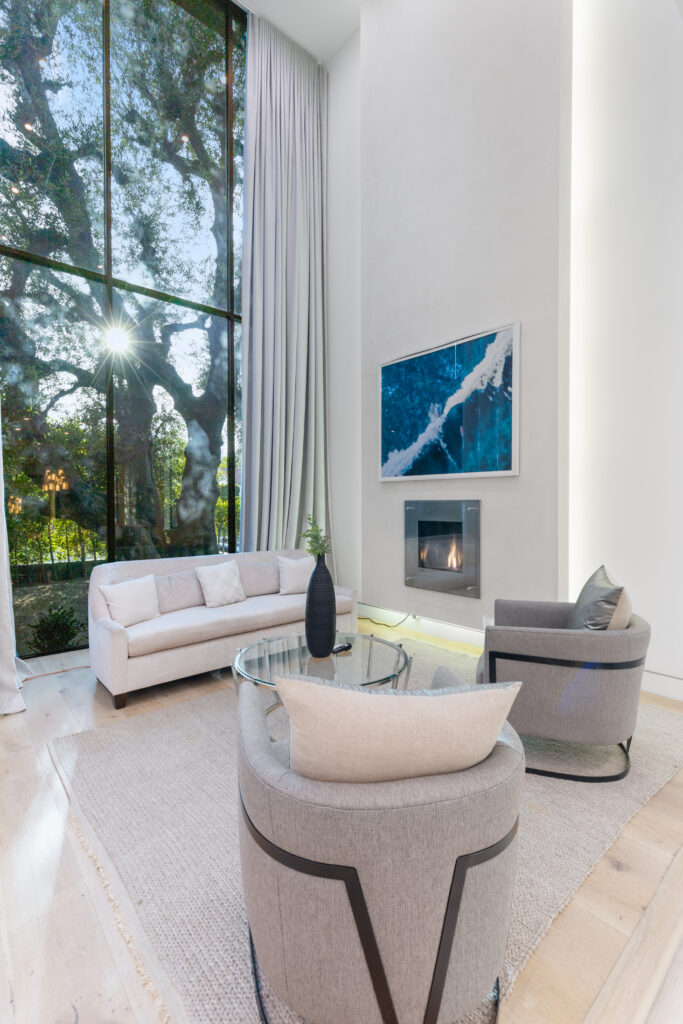 Luxury living room with soaring ceilings and gallery-quality finishes at Detroit House.