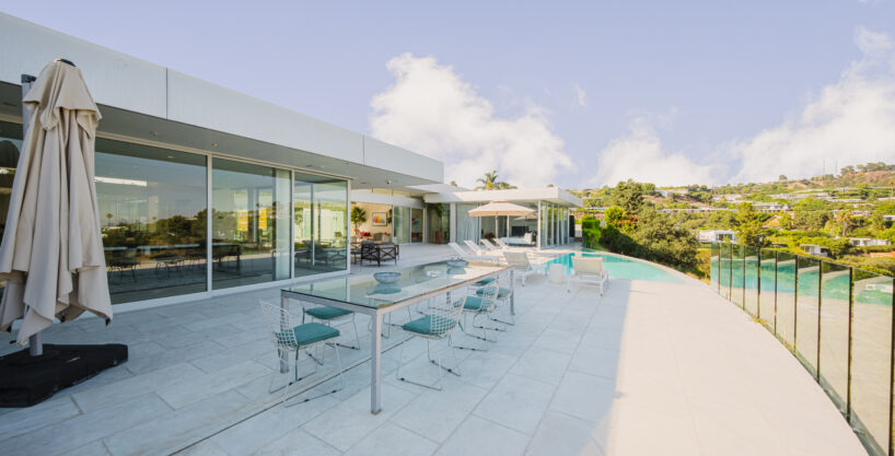 Loma Coastal Beverly Hills luxury rental terrace with Pacific Ocean sunset views and private pool