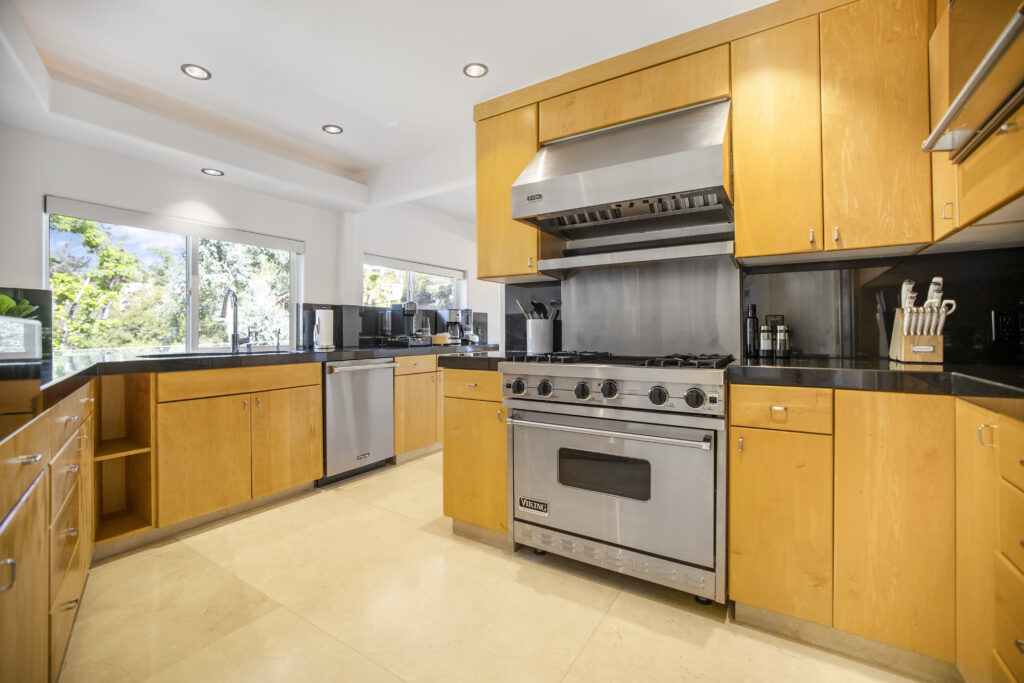 Fully outfitted chef kitchen with high-end appliances at Nichols Sanctuary.