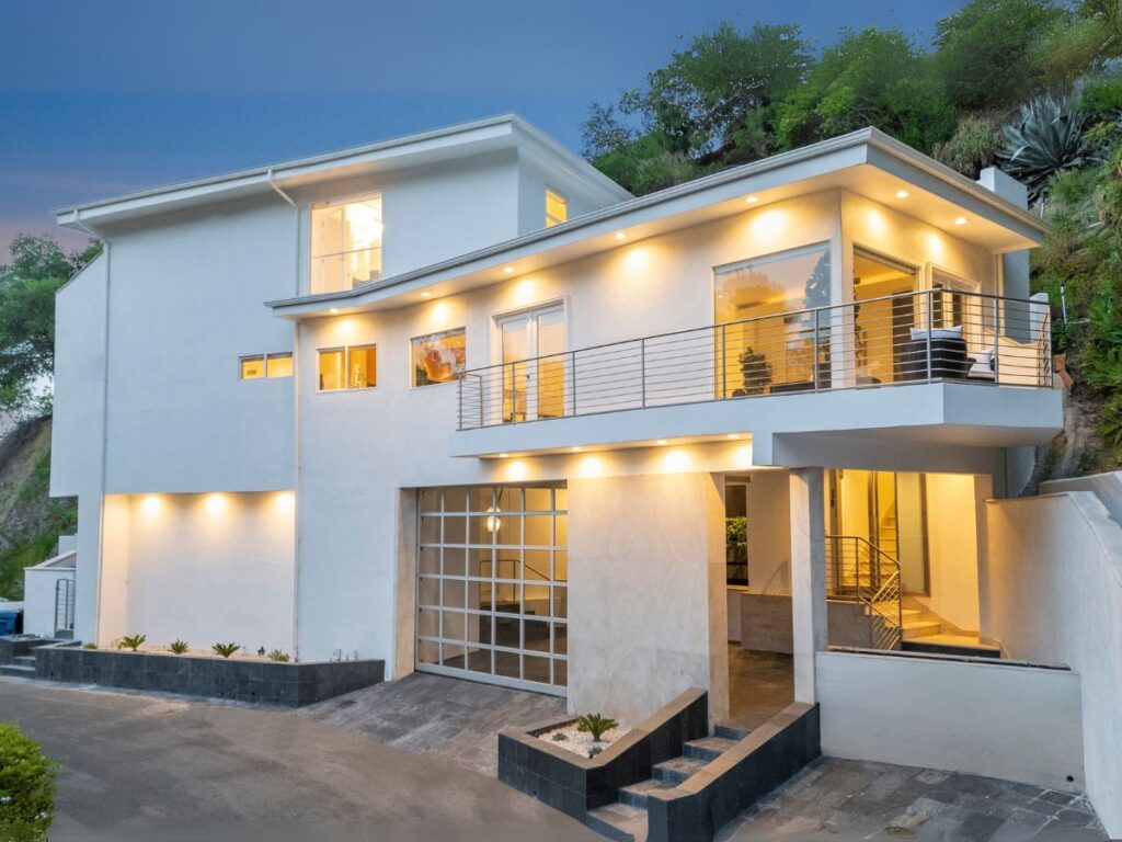 Modern luxury vacation rental Nichols Sanctuary in Hollywood Hills at night.