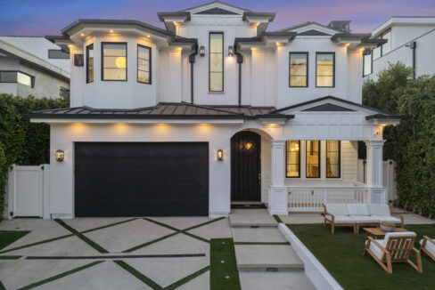 Front facade of the contemporary Los Angeles villa showing the garage entrance.