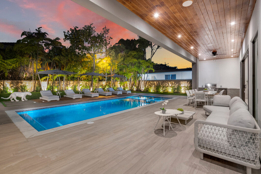 Villa Emerald in Miami, the pool lit at dusk
