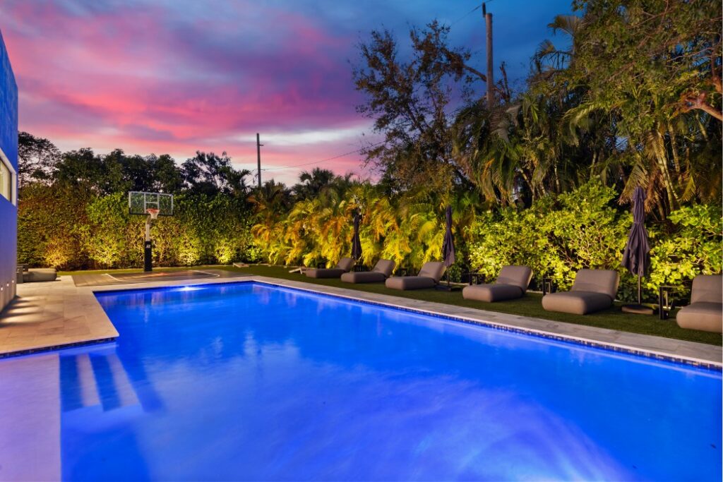 Villa Maya swimming pool illuminated at twilight